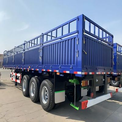 CIMC आयरन मटेरियल 3 धुरा 40-80 टन क्षमता स्टेक टाइप भारी कार्गो वैन टाइप हाई फेंस वेयरहाउस सेमी ट्रक ट्रेलर